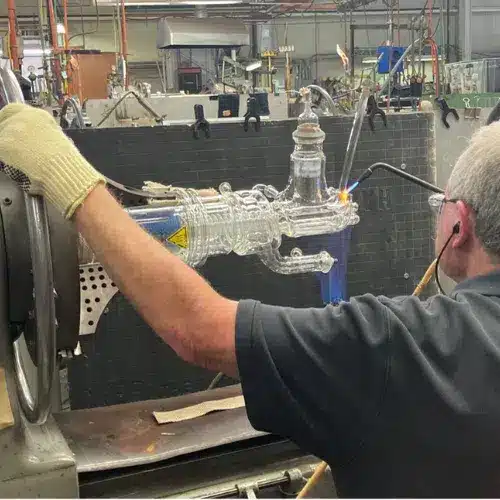 H.S Martin's glassblower repairing a custom laboratory glassware
